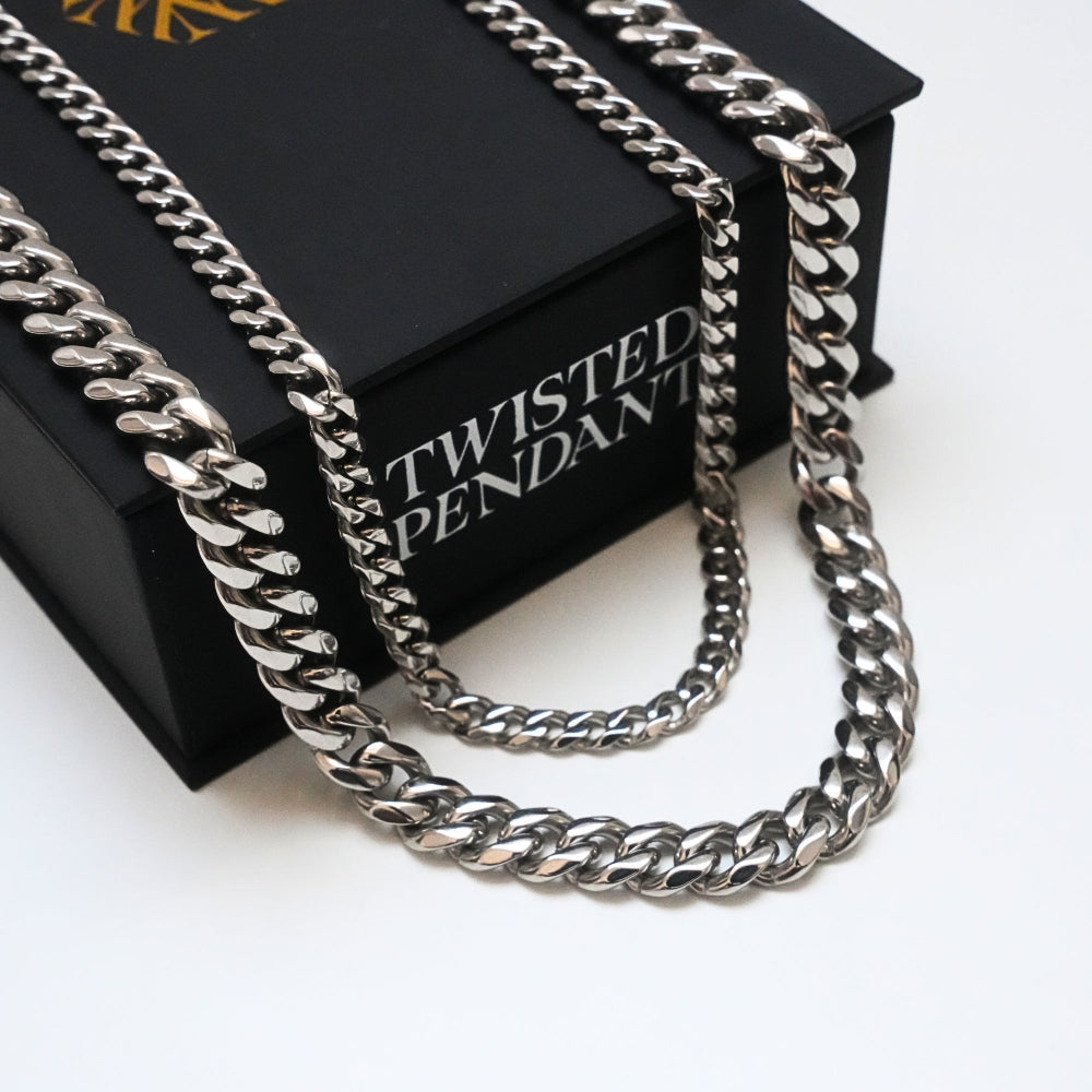 Silver chain necklace on a black box with 'Twisted Pendant' text.