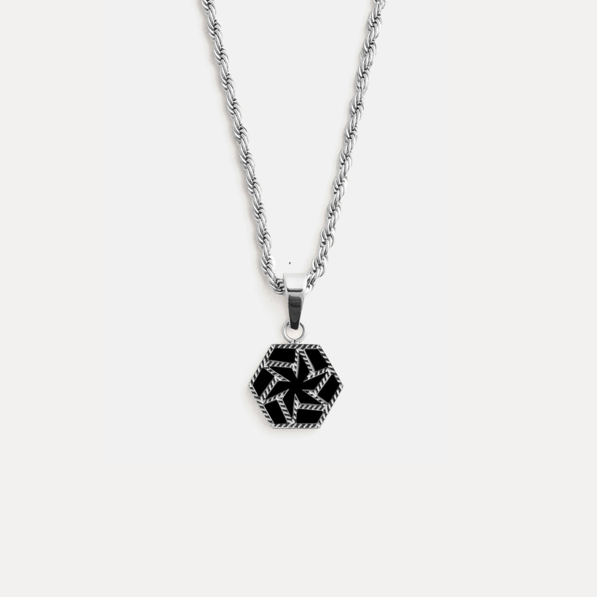 Necklace with a geometric pendant on a white background