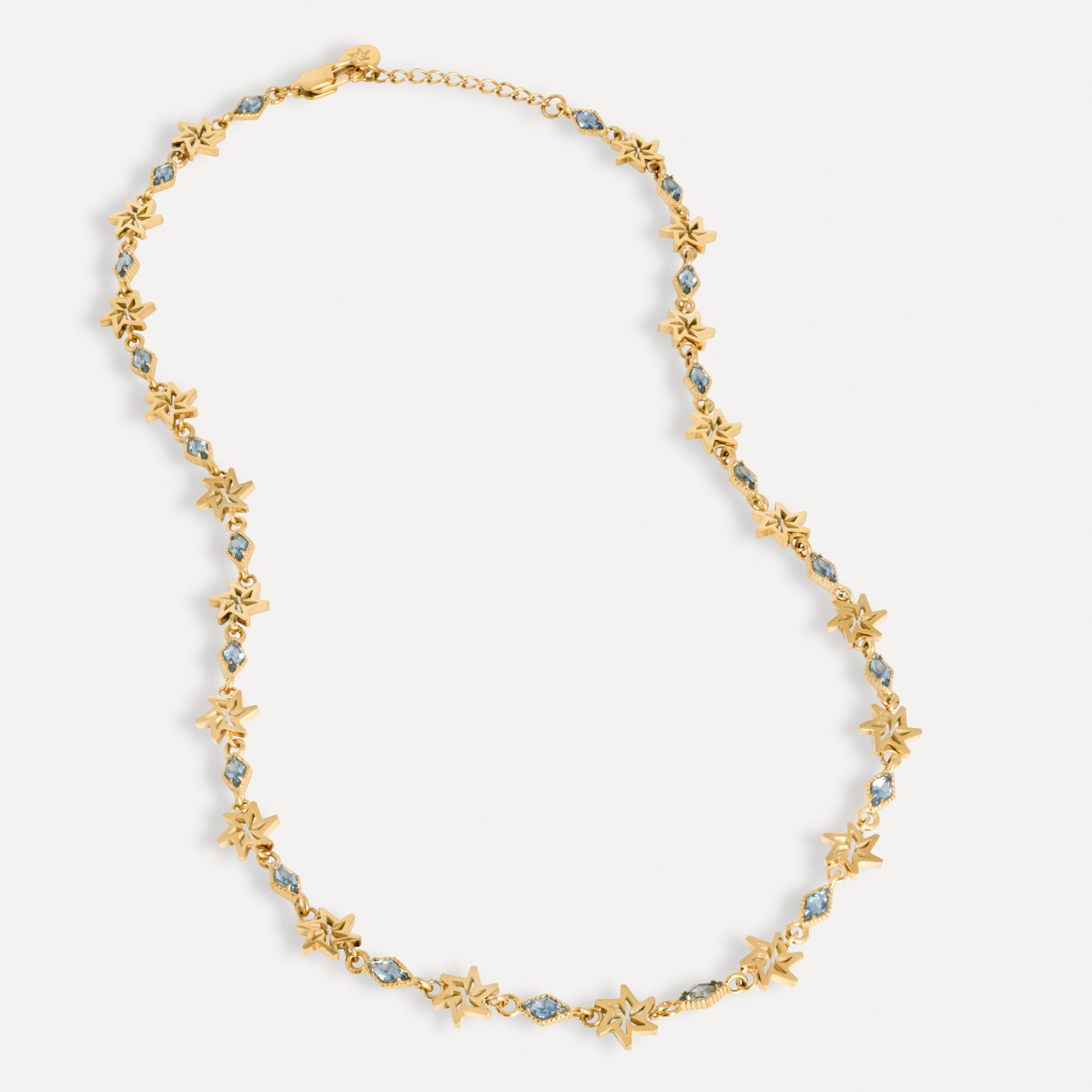Gold necklace with star-shaped elements on a white background
