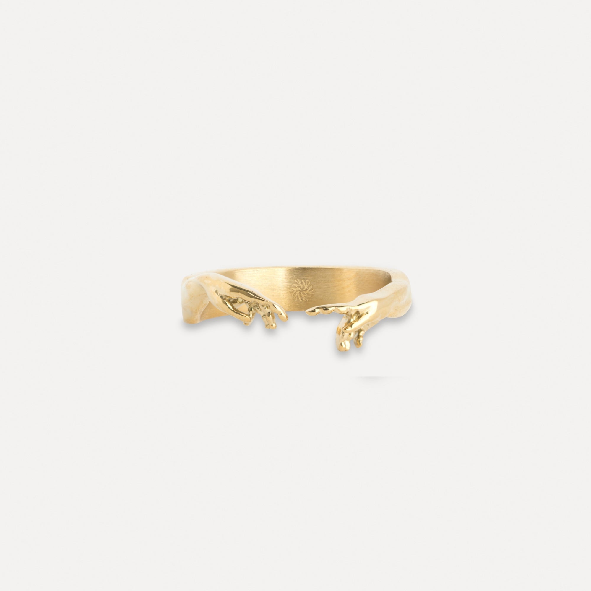 Gold ring on a white background