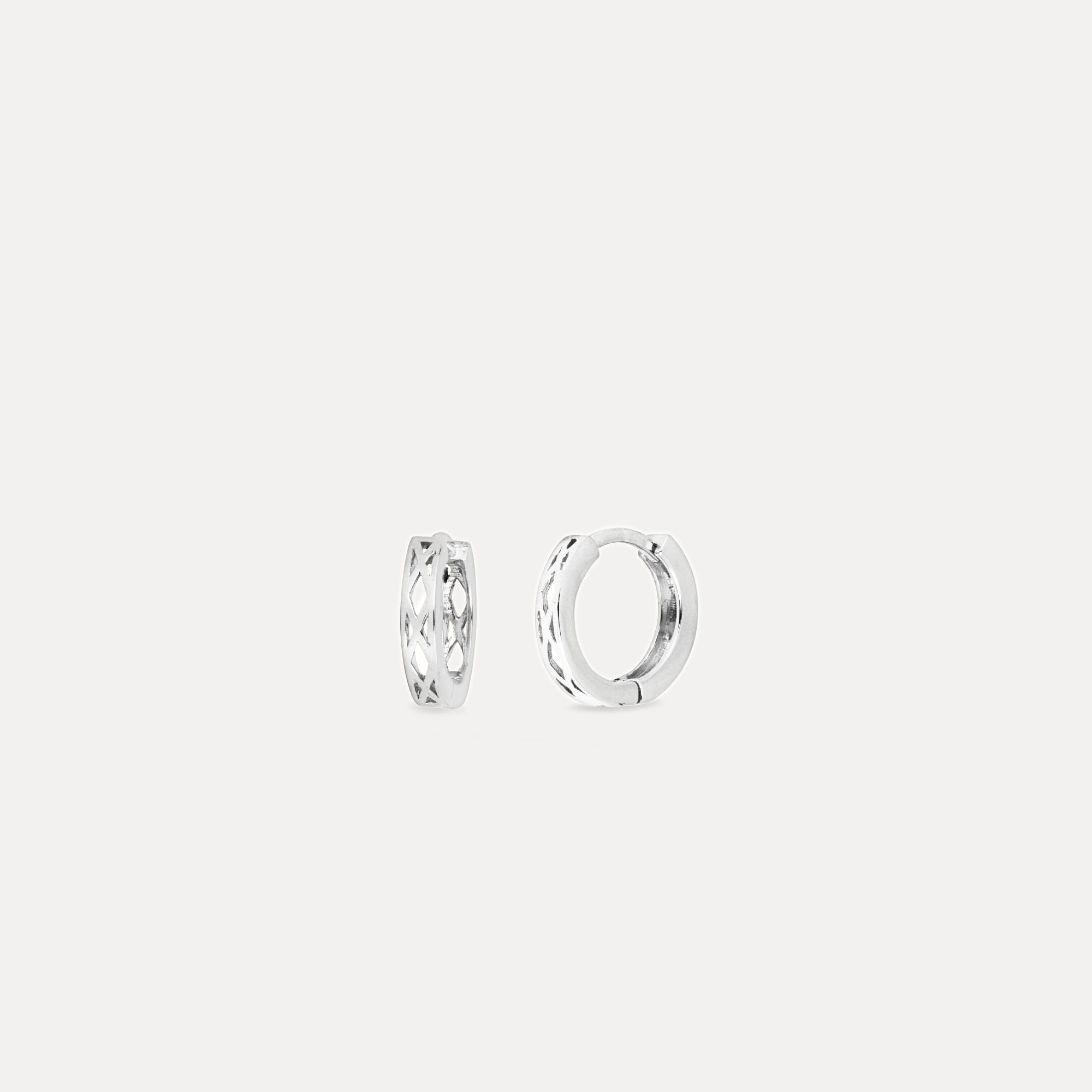 Pair of silver hoop earrings on a light gray background