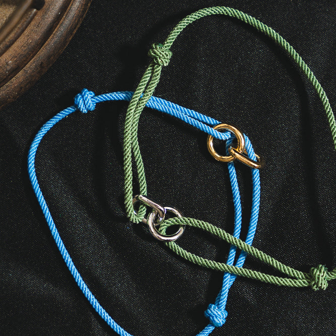 Green and blue rope halter on a black background