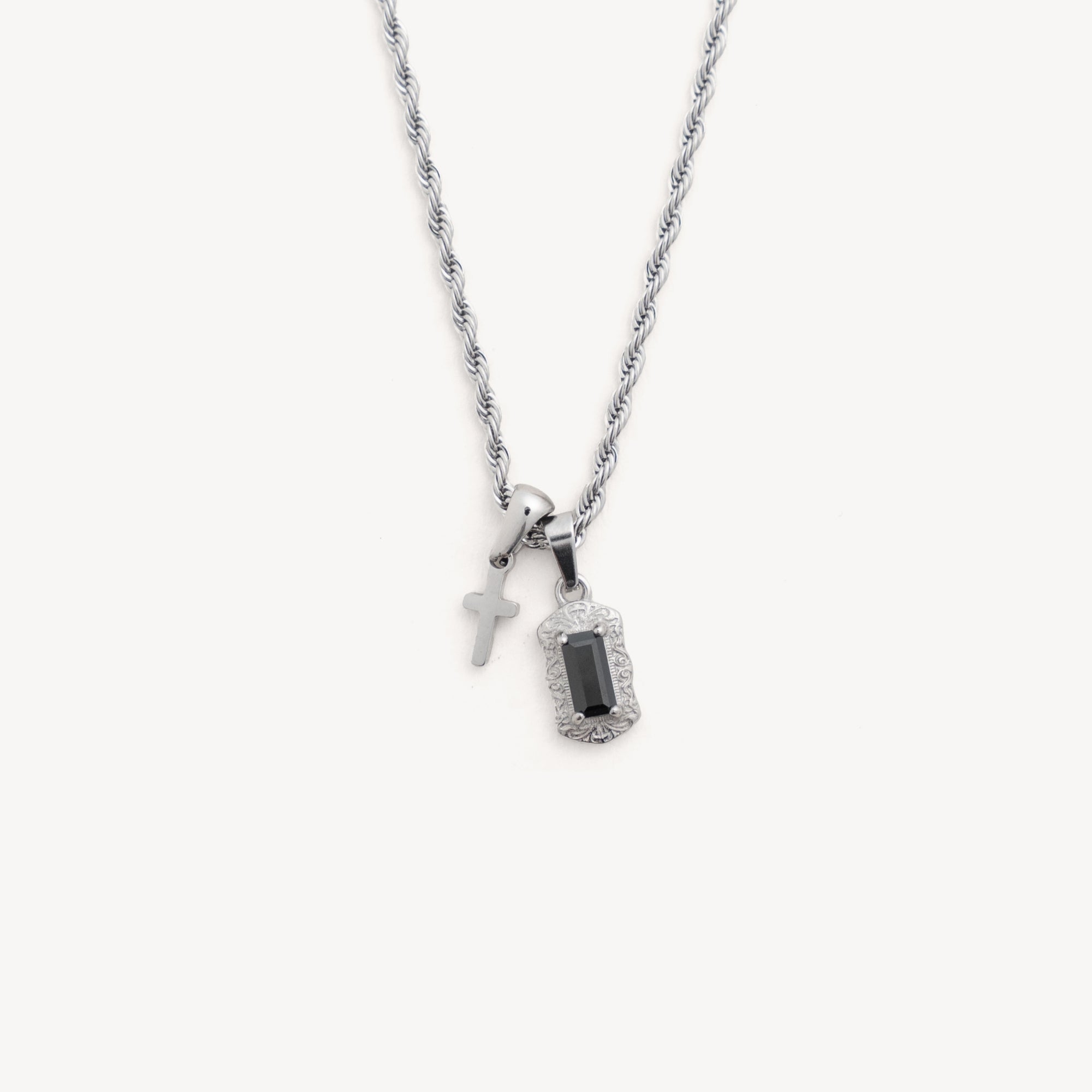 Necklace with two pendants on a white background