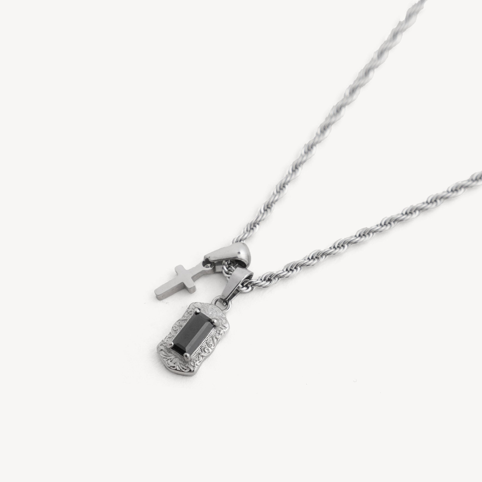 Necklace with two pendants on a white background