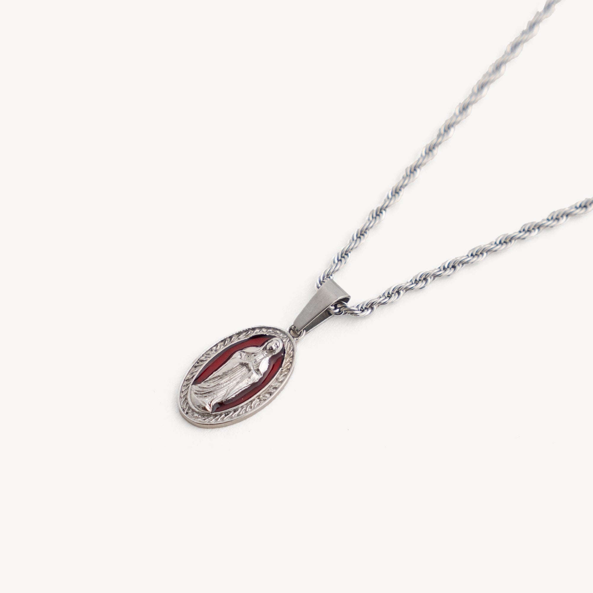 Silver necklace with a pendant on a white background