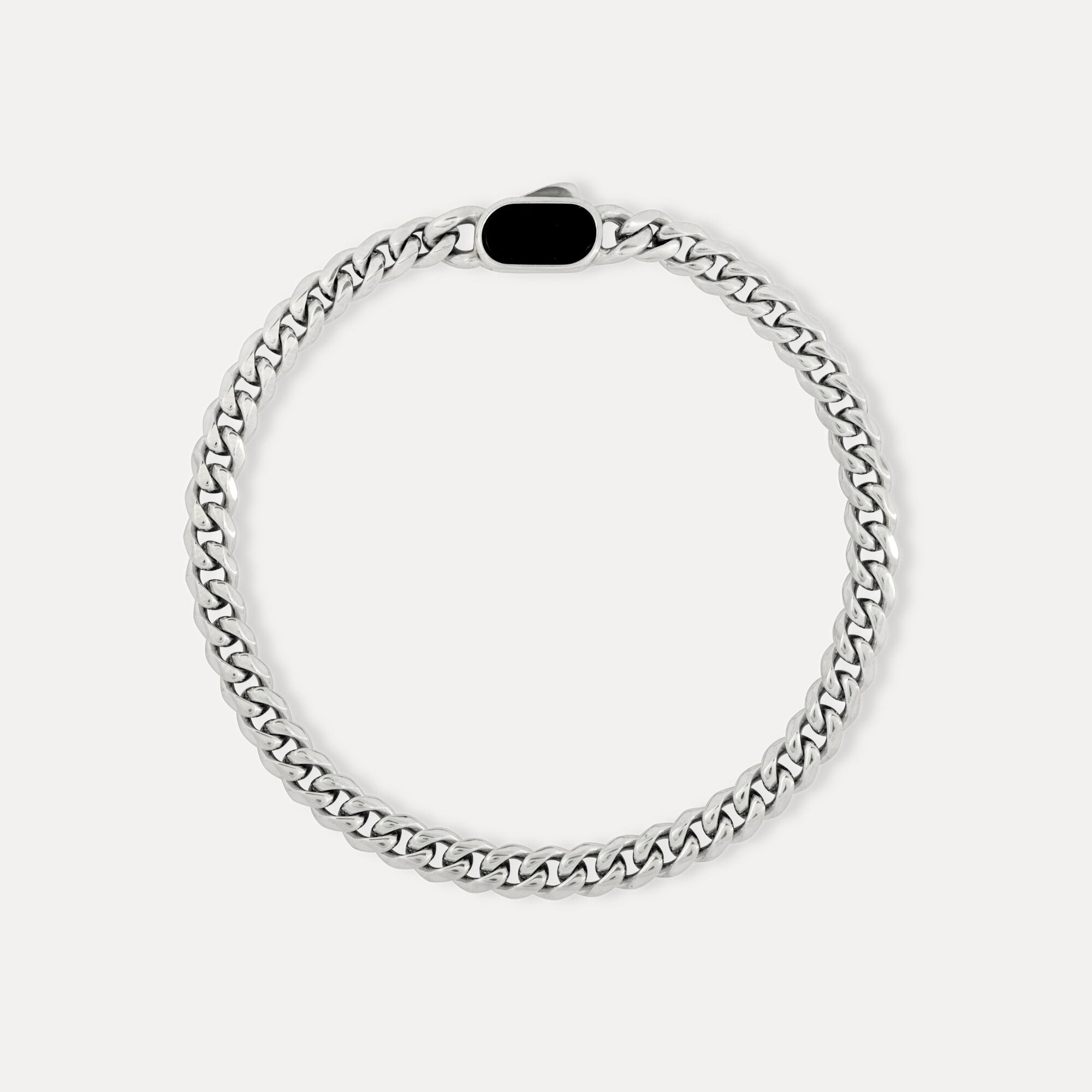 Silver chain bracelet on a white background