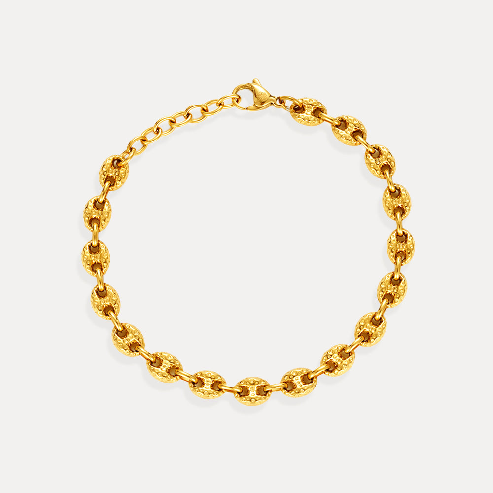 Gold chain bracelet on a white background