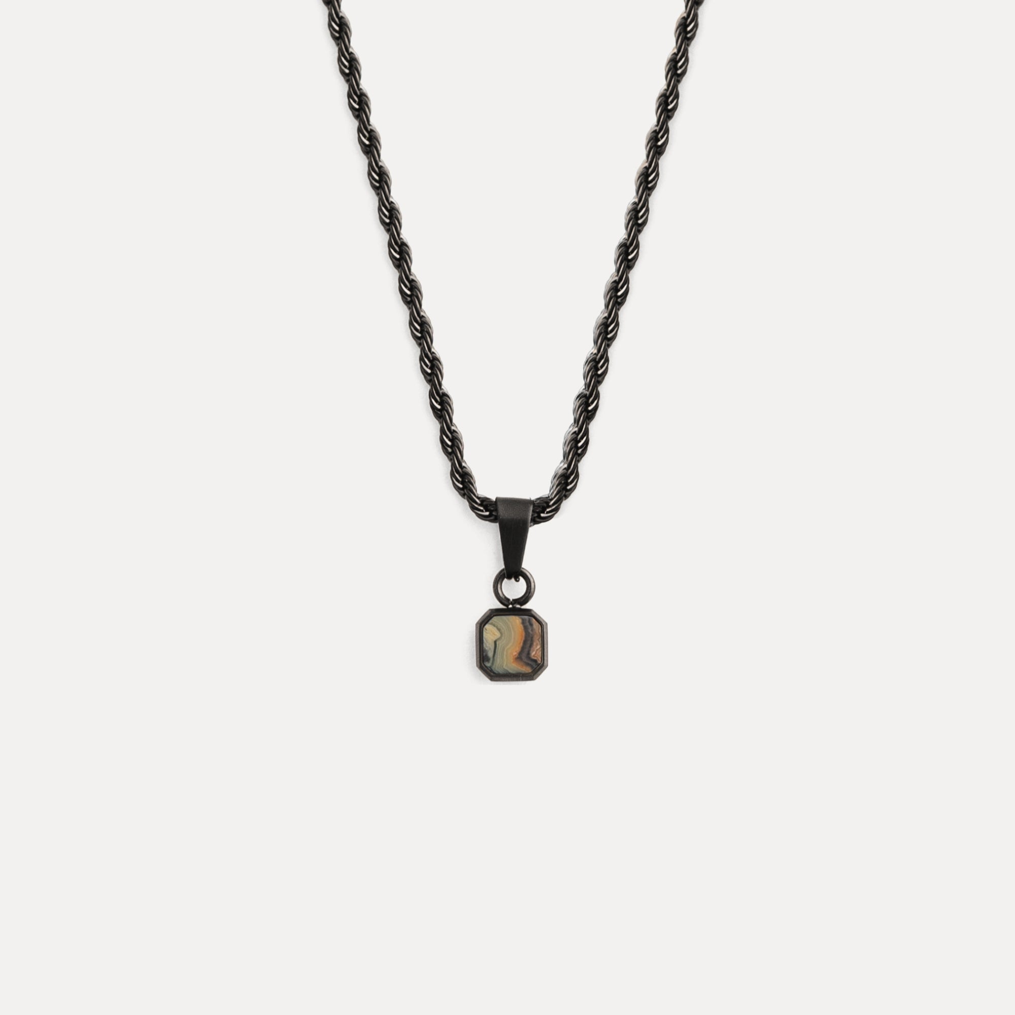 Necklace with a pendant on a white background