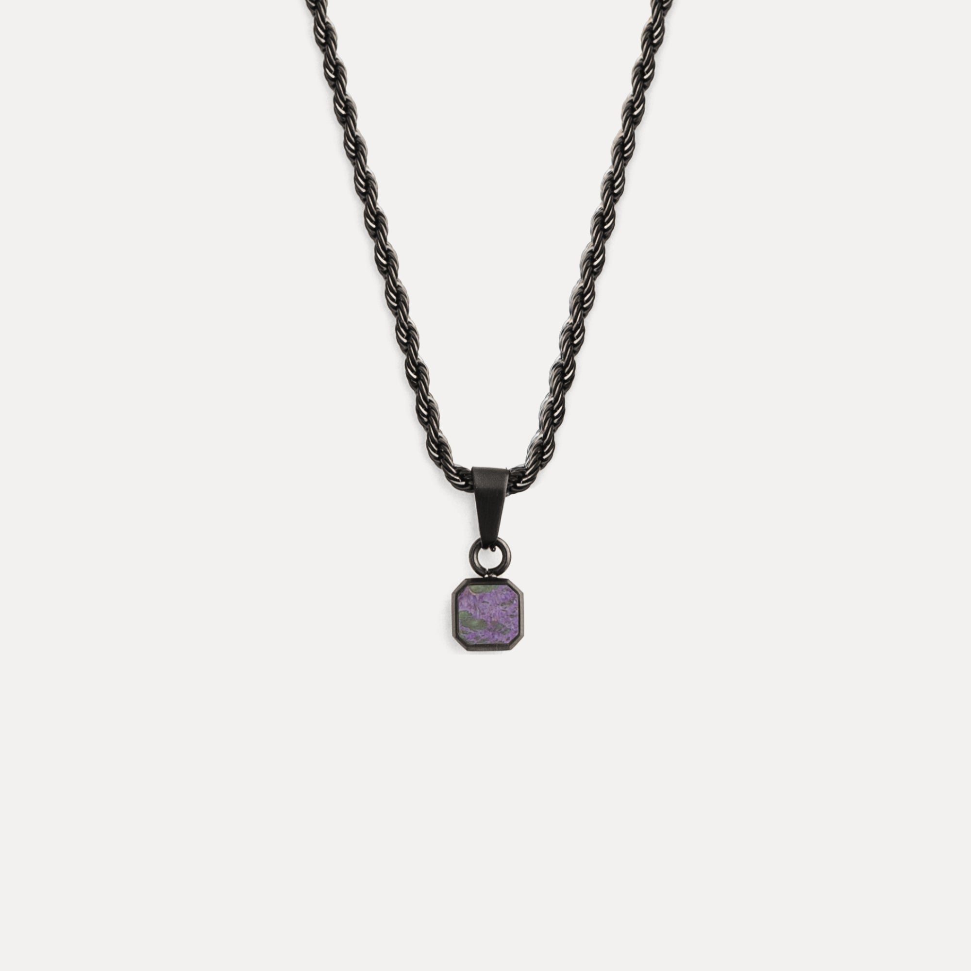 Necklace with a purple pendant on a white background
