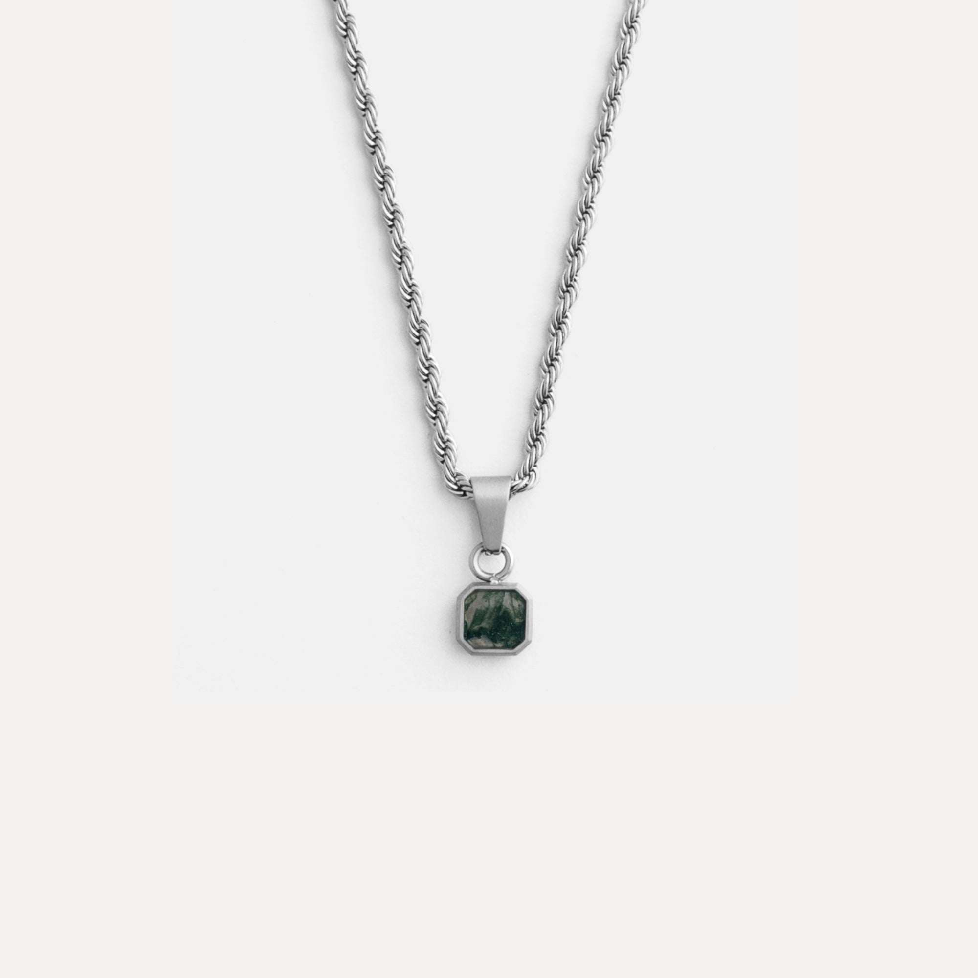 Necklace with a pendant on a white background