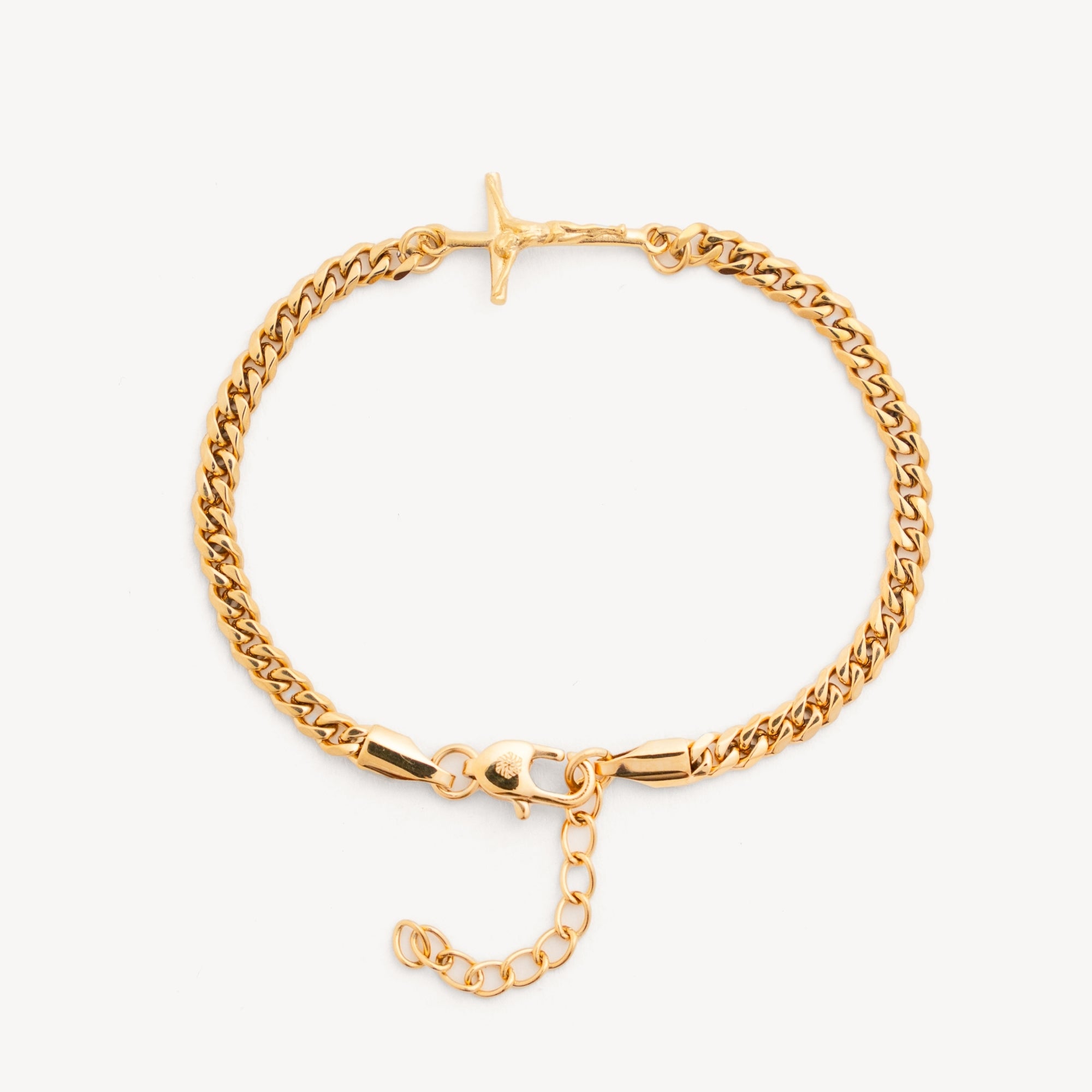 Gold chain bracelet on a white background