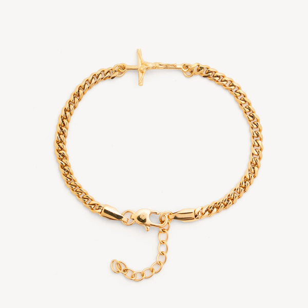 Gold chain bracelet on a white background