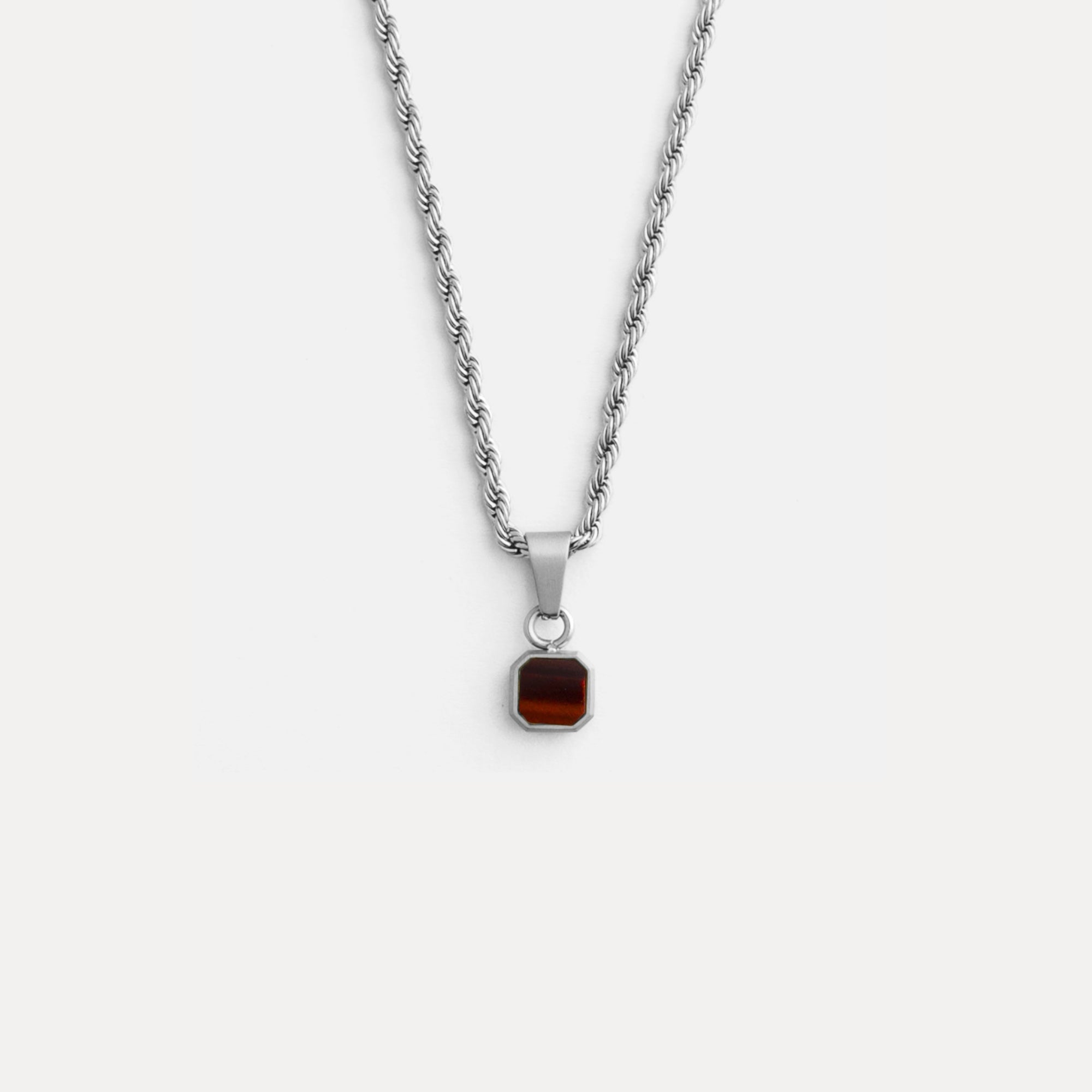 Necklace with a square pendant on a white background