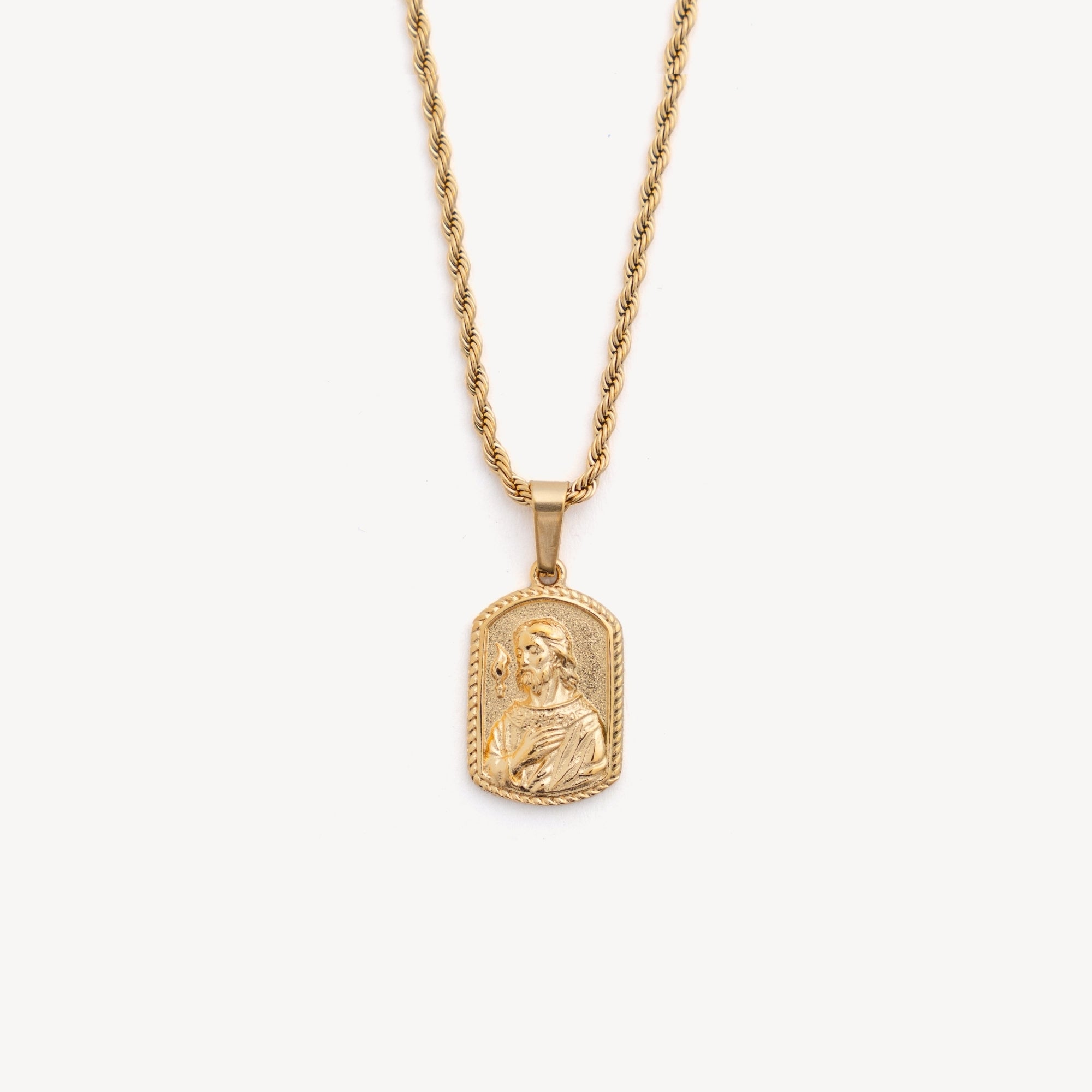 Gold necklace with a pendant on a white background