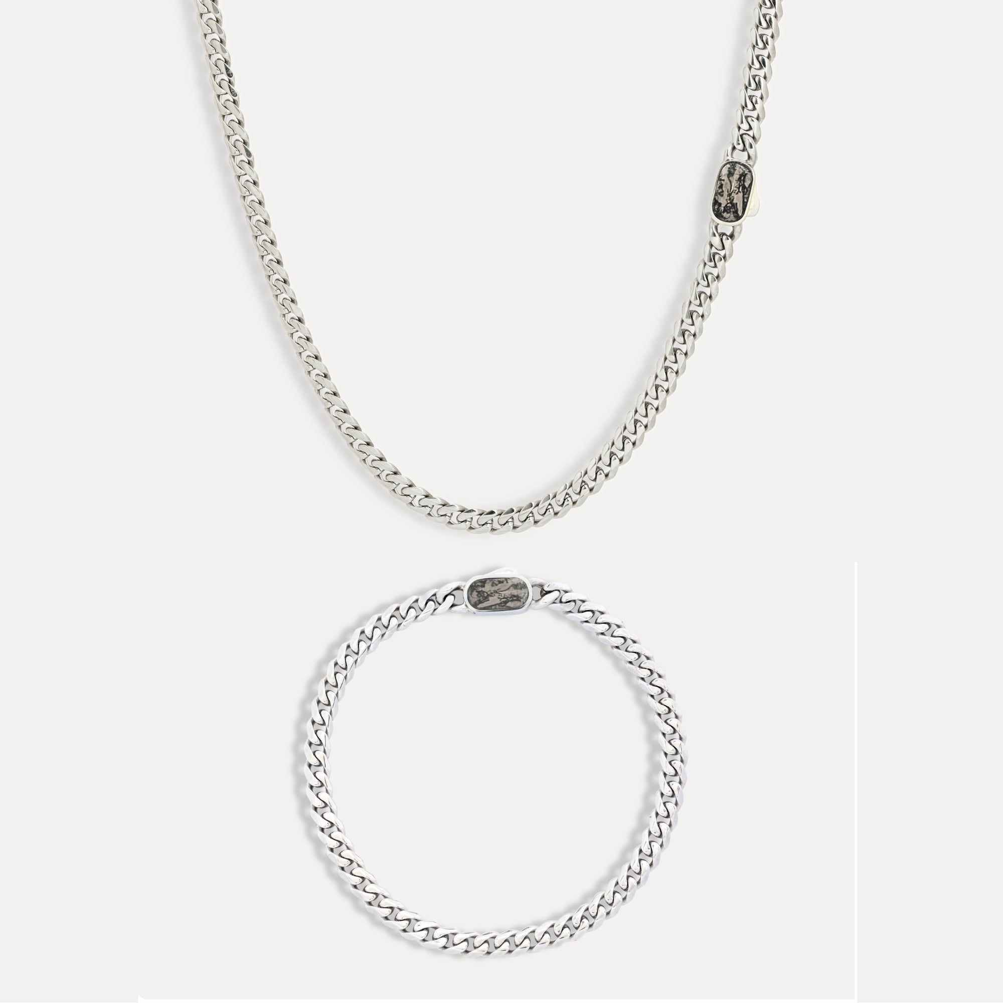 Silver chain necklace on a white background